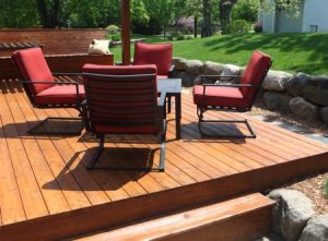 Freshly stained deck after wood repairs on a home near Bent Tree